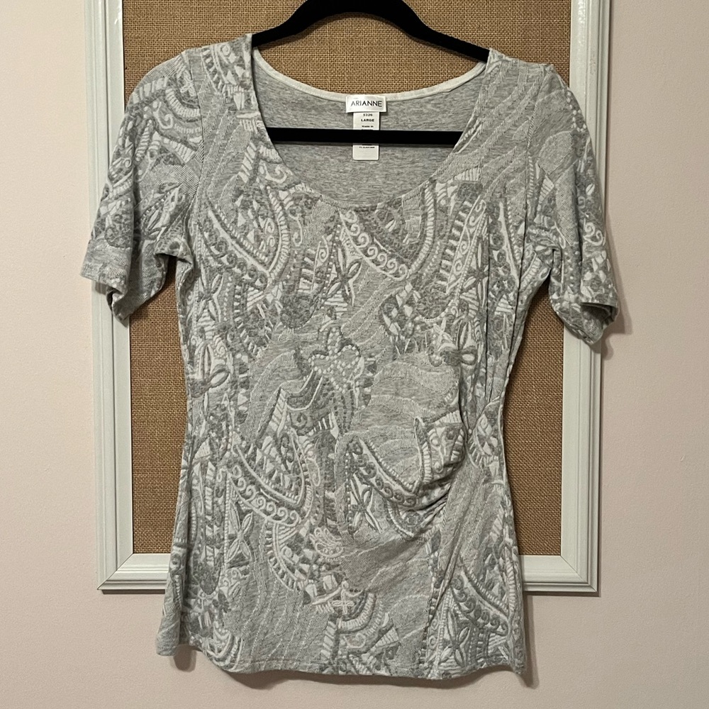 Grey short sleeve blouse. Stretch fabric. From Anthropologie. Size L.